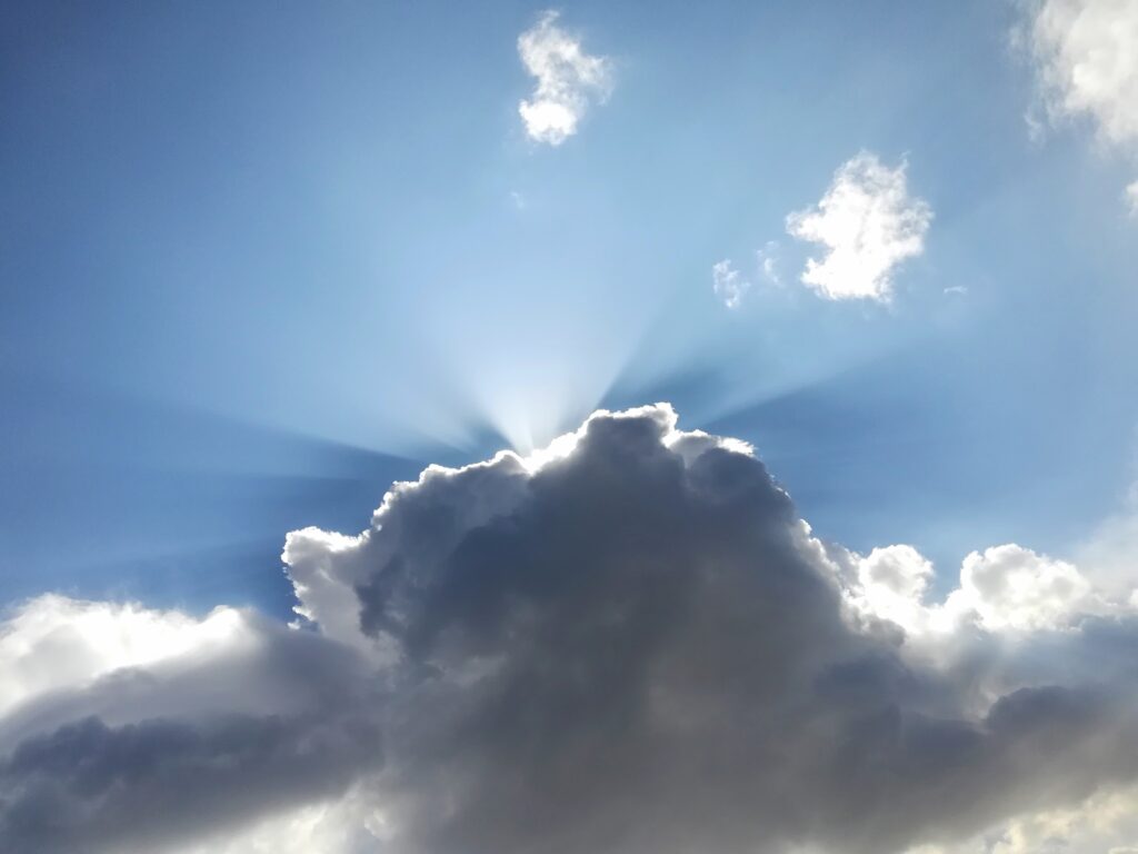 Light coming from behind clouds